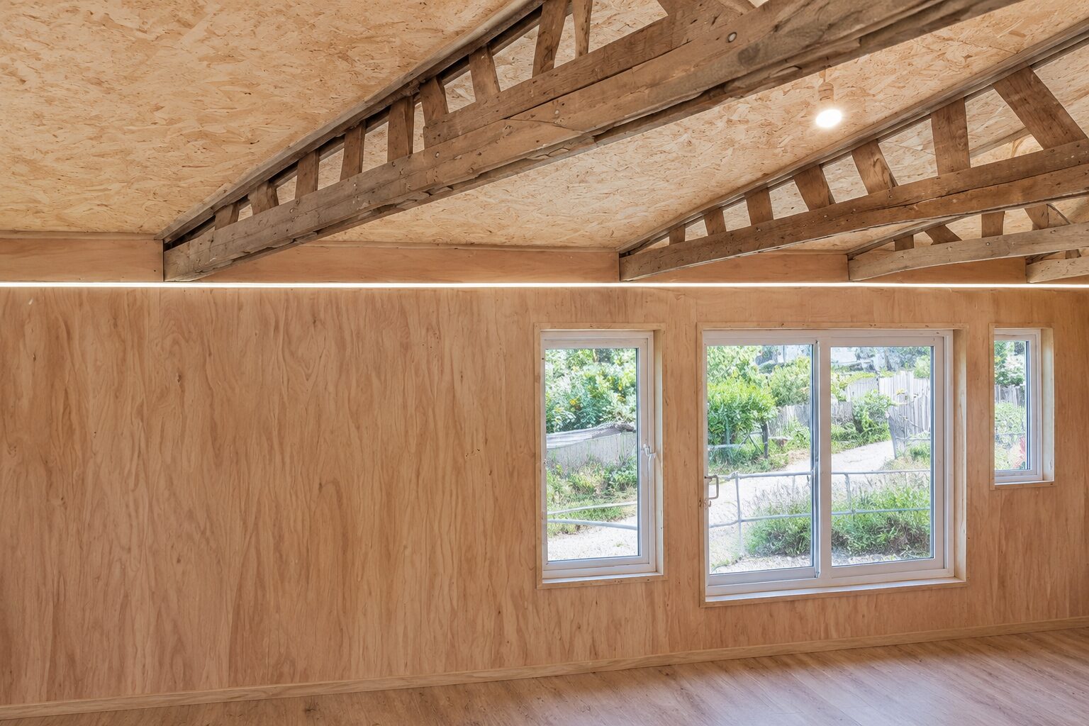 Finished timber-lined interior and retained roof trusses
